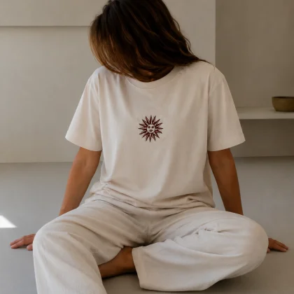 Prenda bordada con Sol de Mayo